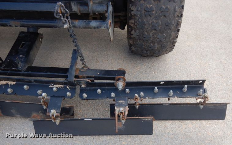 image for item HT9109 2000 Cushman Groom Master bunker rake