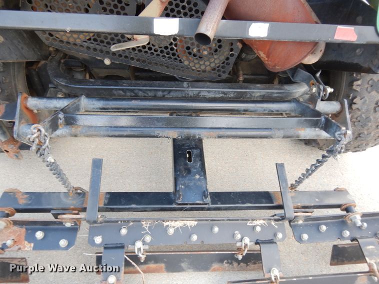 image for item HT9109 2000 Cushman Groom Master bunker rake
