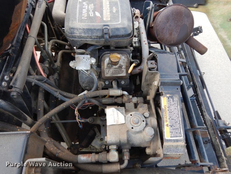image for item HT9109 2000 Cushman Groom Master bunker rake