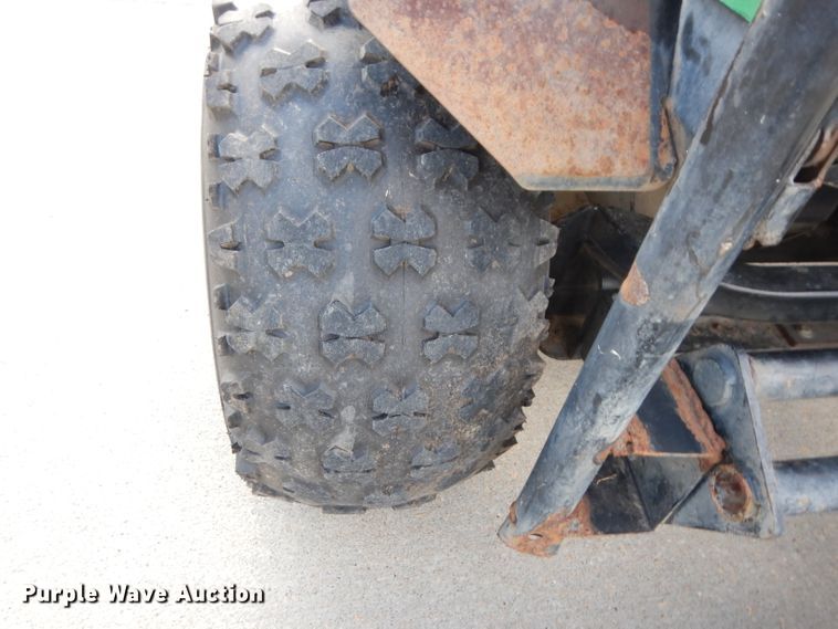 image for item HT9109 2000 Cushman Groom Master bunker rake