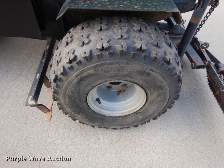 image for item HT9109 2000 Cushman Groom Master bunker rake