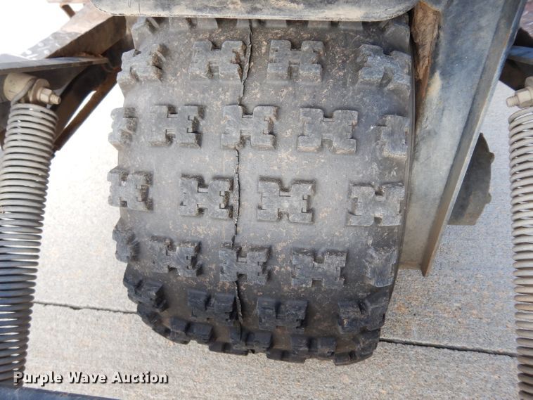 image for item HT9109 2000 Cushman Groom Master bunker rake