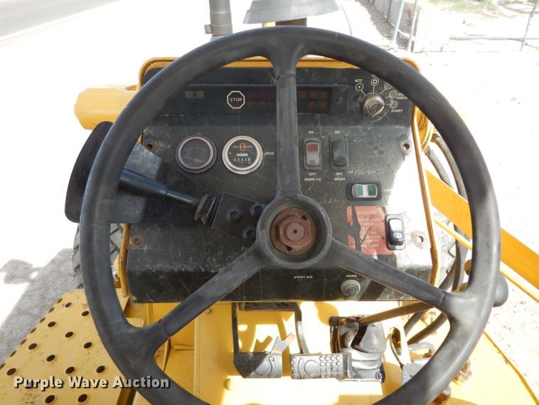 image for item DH2384 2000 John Deere 210LE  landscape tractor