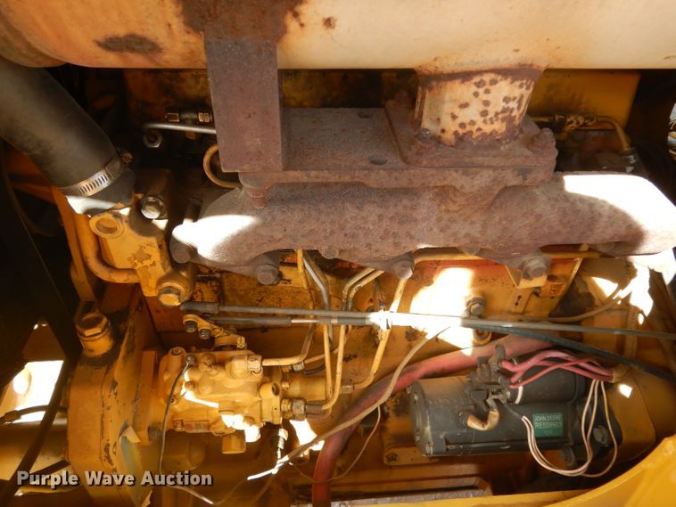 image for item DH2384 2000 John Deere 210LE  landscape tractor