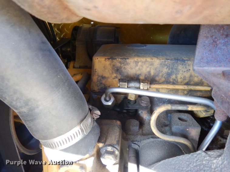 image for item DH2384 2000 John Deere 210LE  landscape tractor