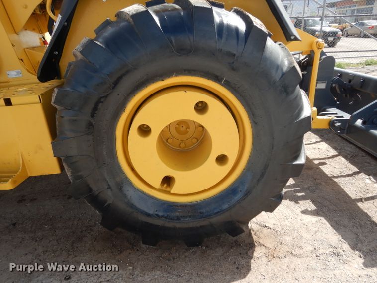 image for item DH2384 2000 John Deere 210LE  landscape tractor