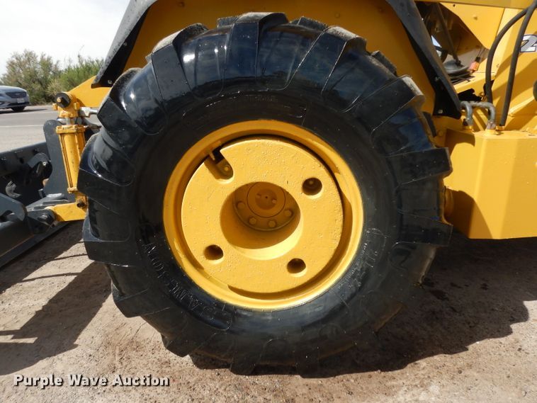 image for item DH2384 2000 John Deere 210LE  landscape tractor