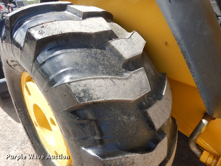 image for item DH2384 2000 John Deere 210LE  landscape tractor