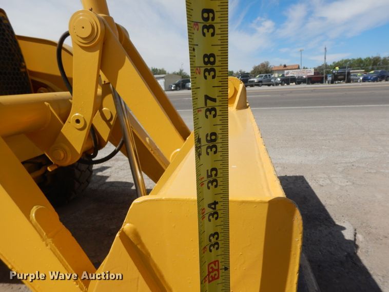 image for item DH2384 2000 John Deere 210LE  landscape tractor