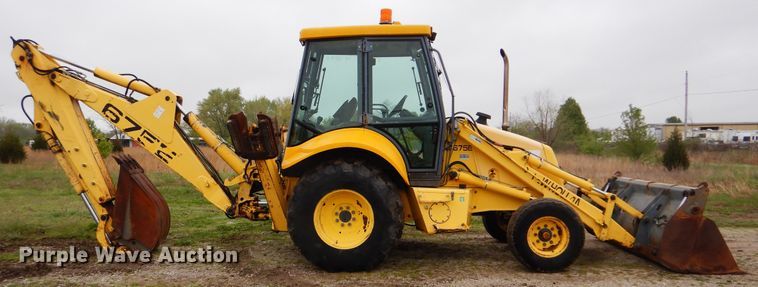 image for item GF9152 2000 New Holland 675E  backhoe