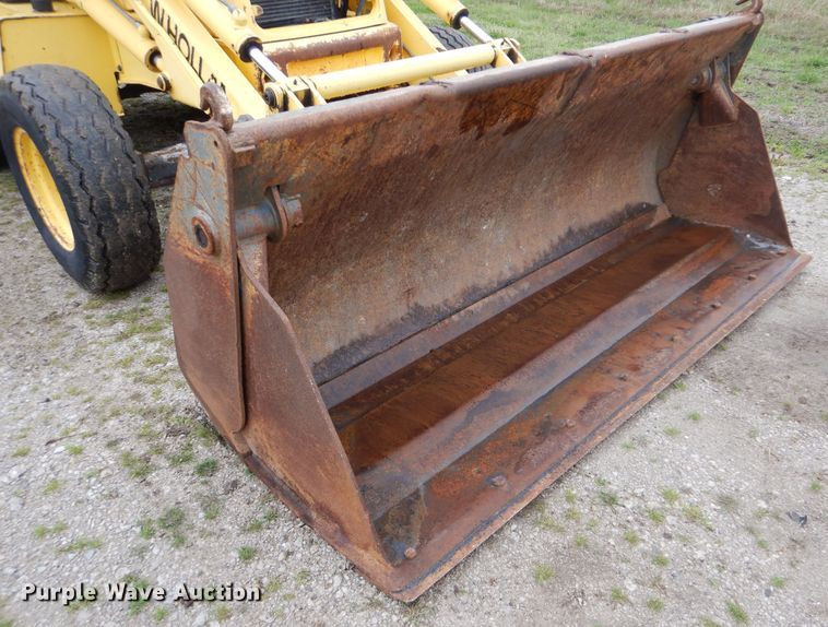 image for item GF9152 2000 New Holland 675E  backhoe