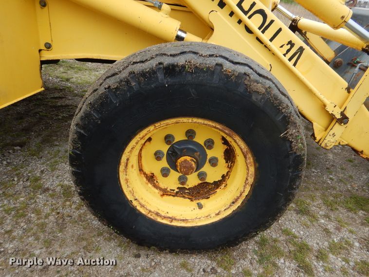 image for item GF9152 2000 New Holland 675E  backhoe