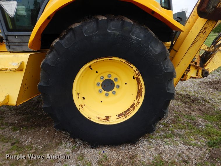 image for item GF9152 2000 New Holland 675E  backhoe