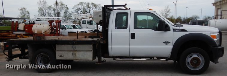 image for item DG6417 2011 Ford F450 Super Duty XL SuperCab flatbed truck
