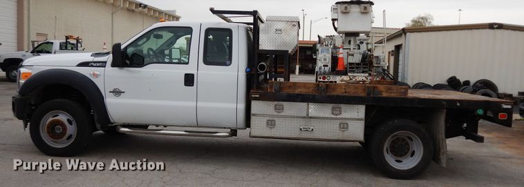 image for item DG6417 2011 Ford F450 Super Duty XL SuperCab flatbed truck