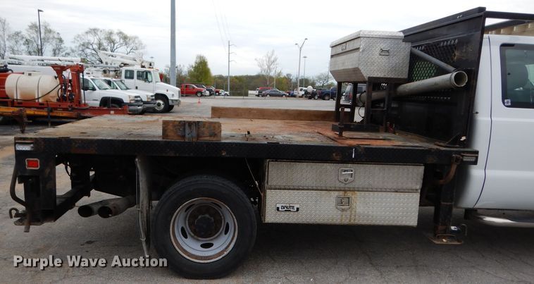 image for item DG6417 2011 Ford F450 Super Duty XL SuperCab flatbed truck