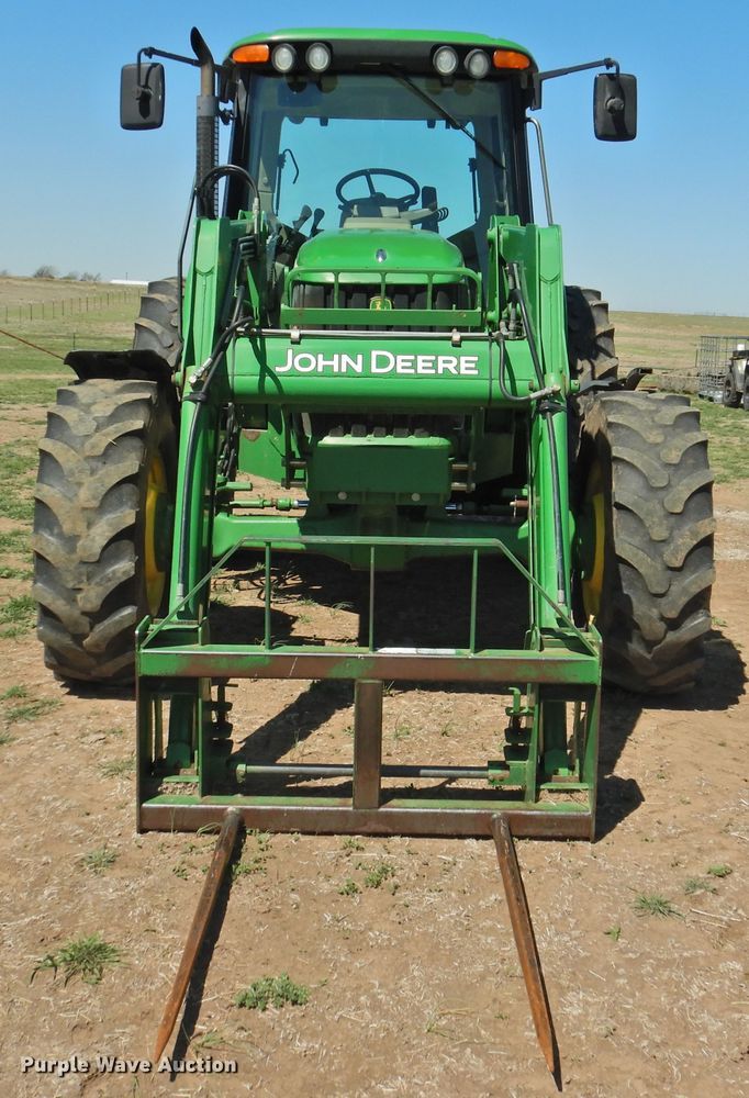 image for item DI0083 2005 John Deere 6420 MFWD tractor