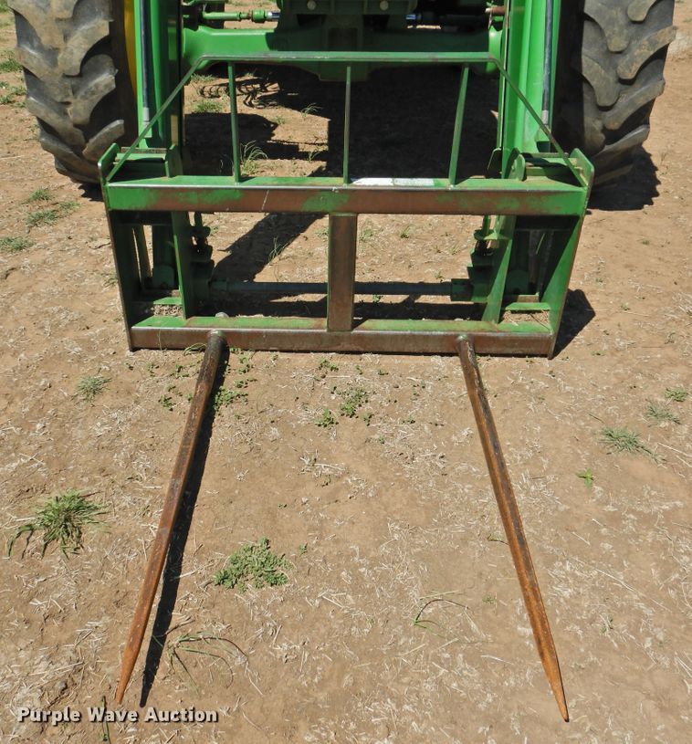 image for item DI0083 2005 John Deere 6420 MFWD tractor