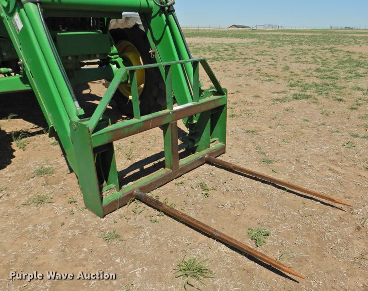 image for item DI0083 2005 John Deere 6420 MFWD tractor