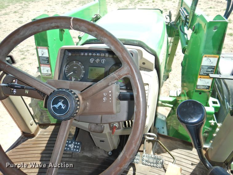 image for item DI0083 2005 John Deere 6420 MFWD tractor