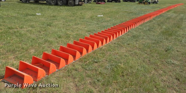 image for item DI0094 Approximately 312 Tiger-Tuff conveyor buckets with conveyor belt
