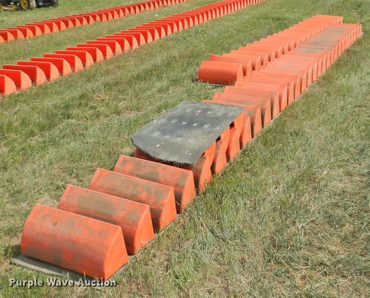 image for item DI0094 Approximately 312 Tiger-Tuff conveyor buckets with conveyor belt