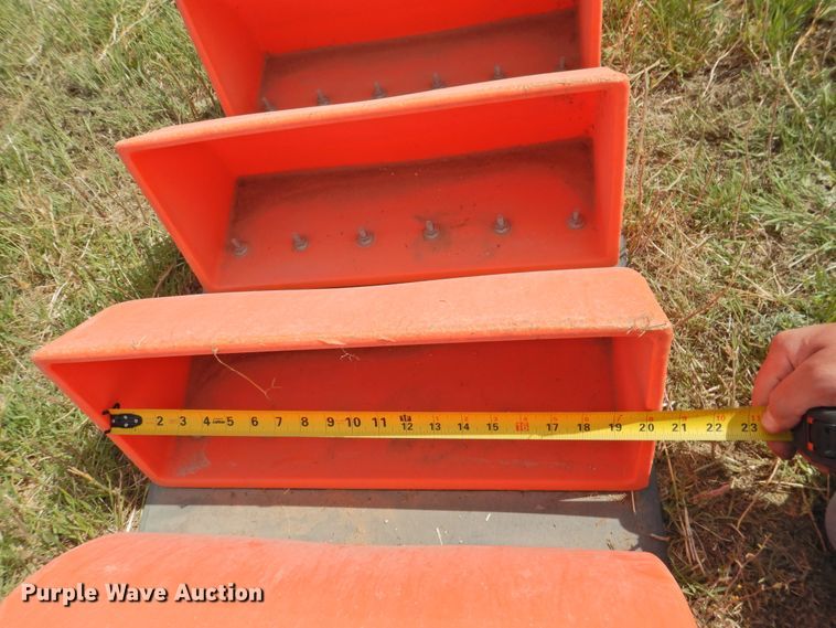 image for item DI0094 Approximately 312 Tiger-Tuff conveyor buckets with conveyor belt