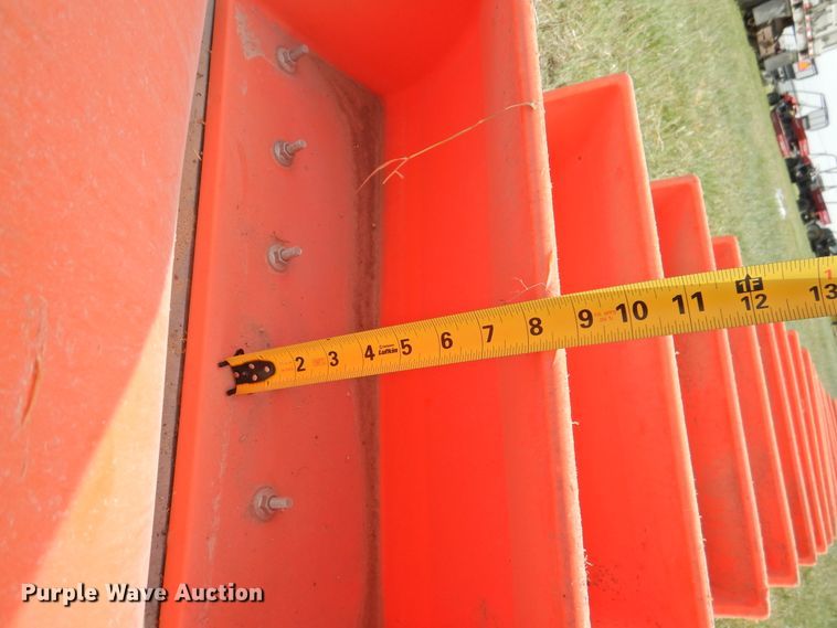 image for item DI0094 Approximately 312 Tiger-Tuff conveyor buckets with conveyor belt