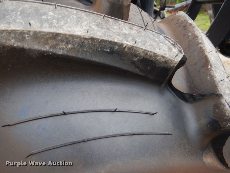 image for item GP9147 2004 New Holland TS115A tractor