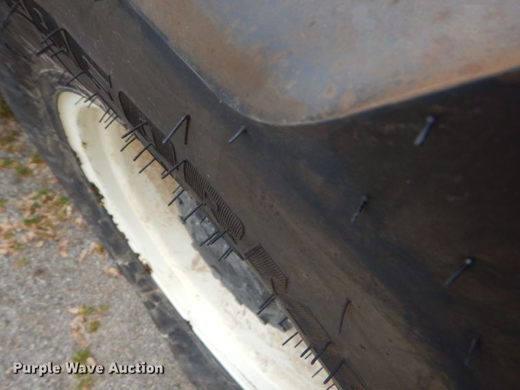 image for item GP9147 2004 New Holland TS115A tractor