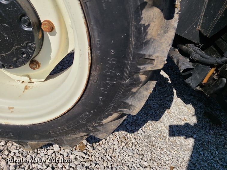 image for item K5828 2004 New Holland TN75DA tractor