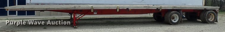 image for item DG3065 1994 Featherlite 1010 flatbed trailer