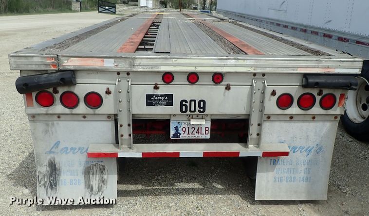 image for item DG3065 1994 Featherlite 1010 flatbed trailer