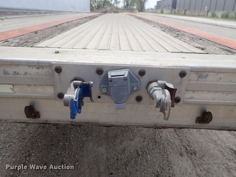 image for item DG3065 1994 Featherlite 1010 flatbed trailer