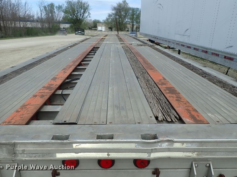 image for item DG3065 1994 Featherlite 1010 flatbed trailer