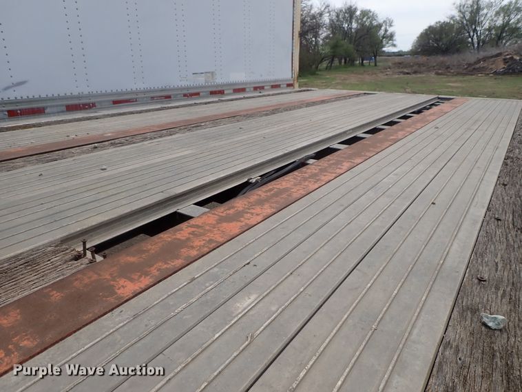 image for item DG3065 1994 Featherlite 1010 flatbed trailer