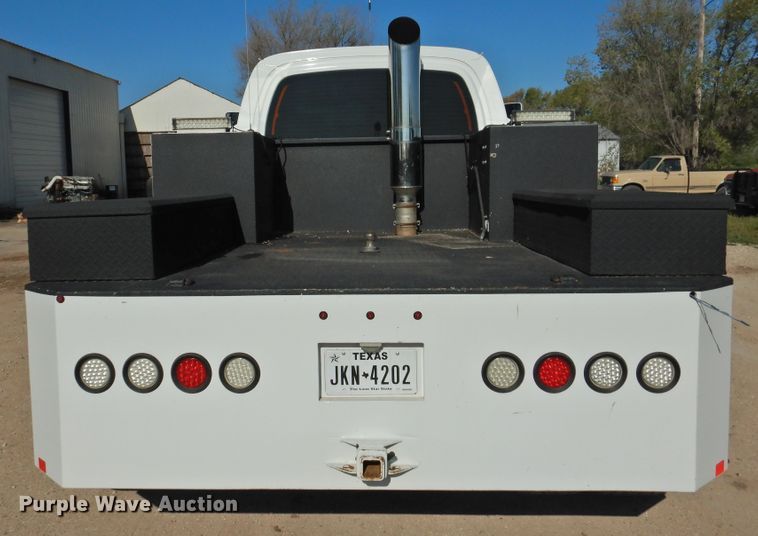 image for item DI0078 2005 GMC C4500 Crew Cab flatbed truck