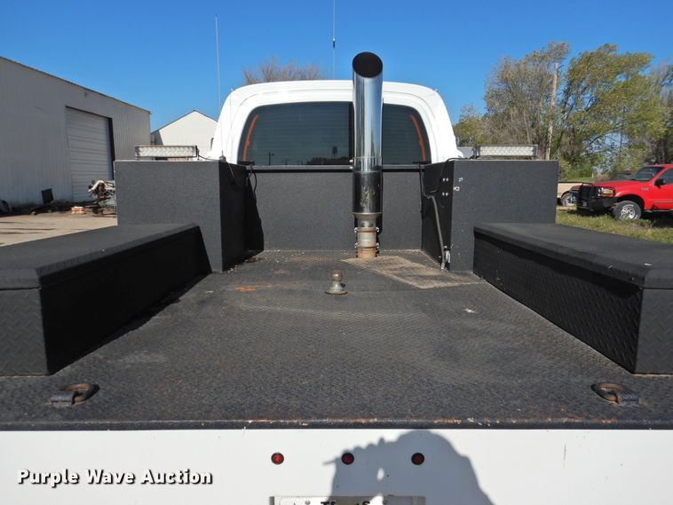 image for item DI0078 2005 GMC C4500 Crew Cab flatbed truck