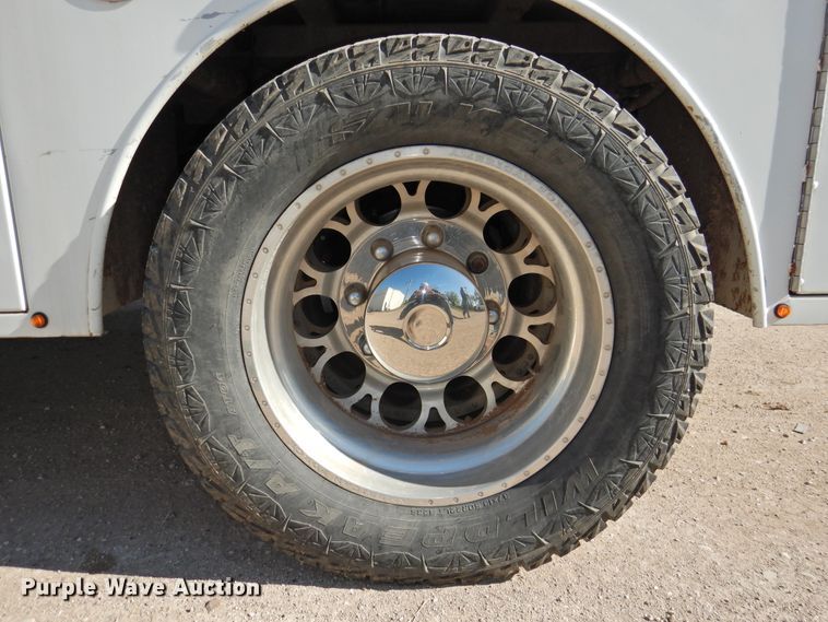 image for item DI0078 2005 GMC C4500 Crew Cab flatbed truck