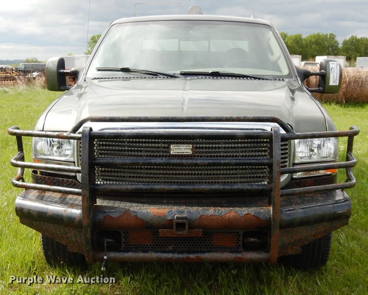 image for item DG6477 2004 Ford F350 Super Duty King Ranch Lariat  Crew Cab utility bed pickup truck