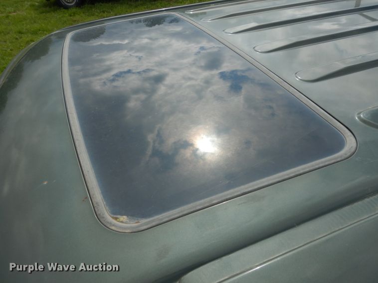 image for item DG6477 2004 Ford F350 Super Duty King Ranch Lariat  Crew Cab utility bed pickup truck