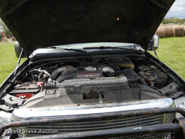 image for item DG6477 2004 Ford F350 Super Duty King Ranch Lariat  Crew Cab utility bed pickup truck