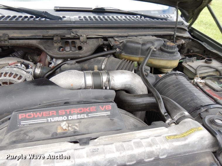 image for item DG6477 2004 Ford F350 Super Duty King Ranch Lariat  Crew Cab utility bed pickup truck