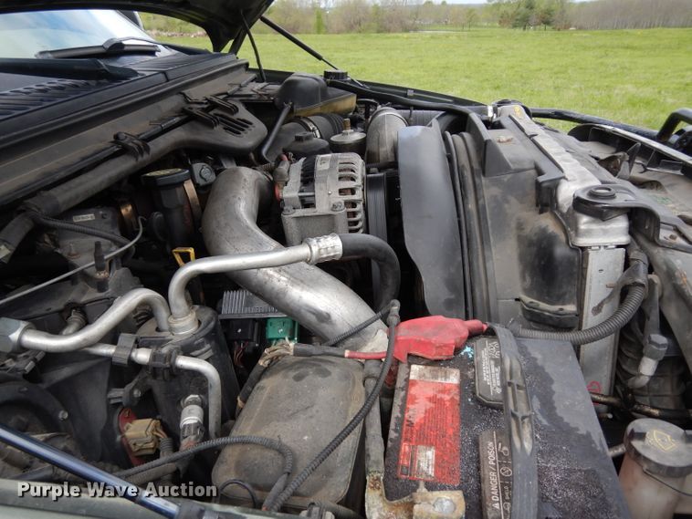 image for item DG6477 2004 Ford F350 Super Duty King Ranch Lariat  Crew Cab utility bed pickup truck