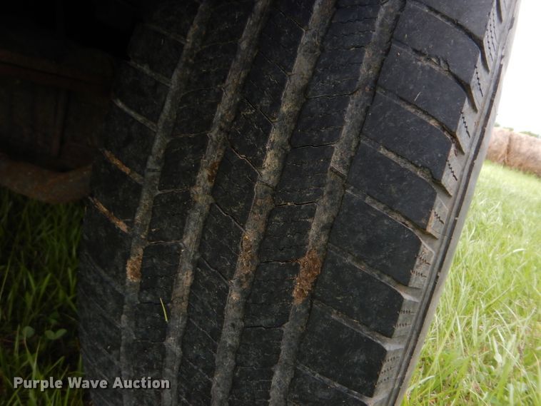 image for item DG6477 2004 Ford F350 Super Duty King Ranch Lariat  Crew Cab utility bed pickup truck