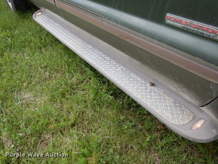 image for item DG6477 2004 Ford F350 Super Duty King Ranch Lariat  Crew Cab utility bed pickup truck