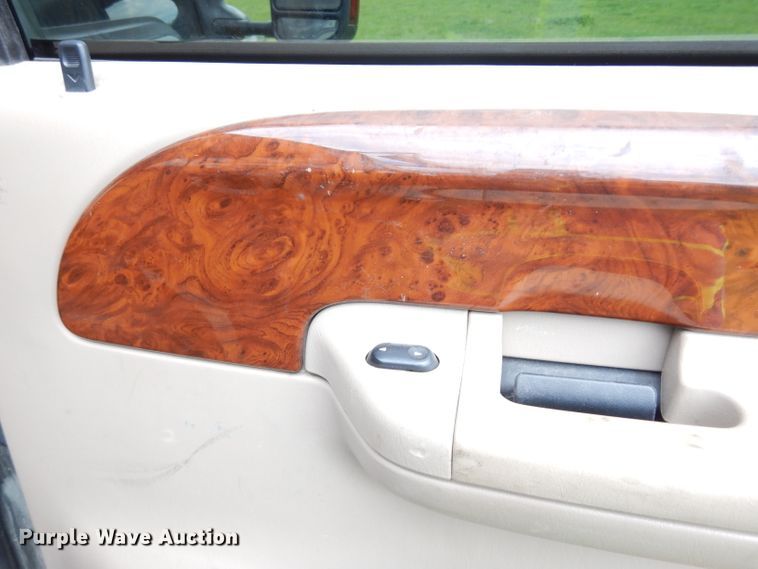 image for item DG6477 2004 Ford F350 Super Duty King Ranch Lariat  Crew Cab utility bed pickup truck