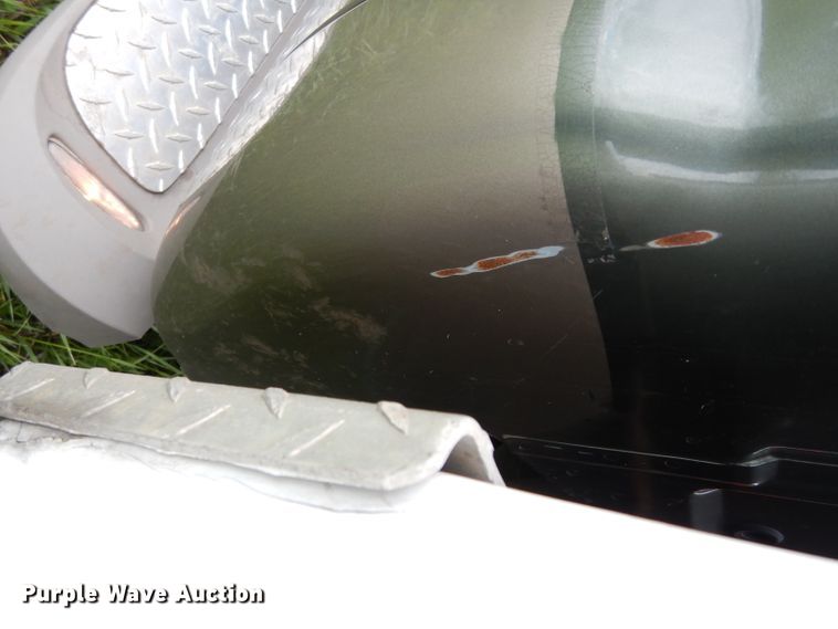 image for item DG6477 2004 Ford F350 Super Duty King Ranch Lariat  Crew Cab utility bed pickup truck