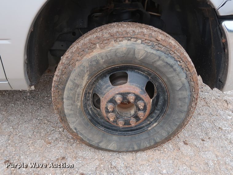 image for item DG7153 2013 Dodge Ram 3500HD  Crew Cab flatbed pickup truck