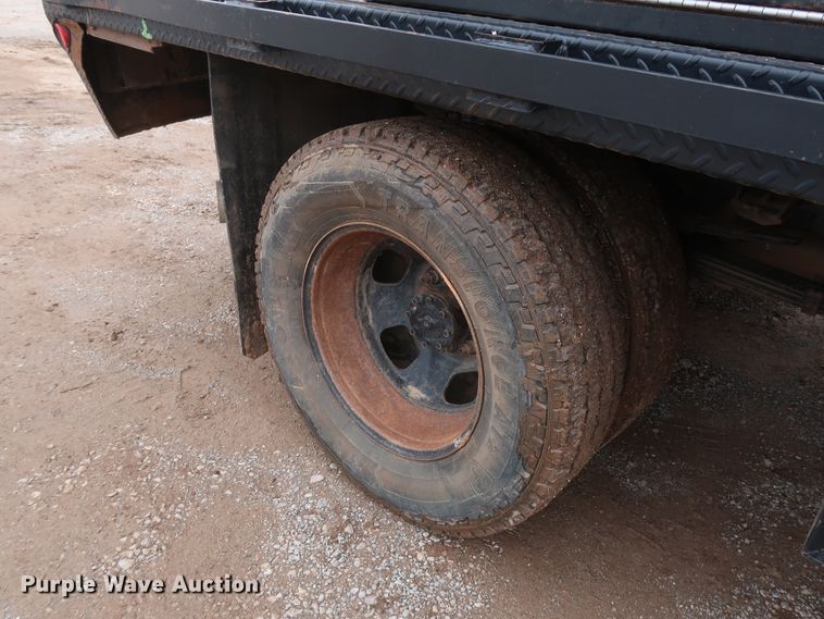 image for item DG7153 2013 Dodge Ram 3500HD  Crew Cab flatbed pickup truck